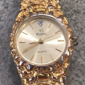 Vintage Elgin Gold nugget ladies watch.